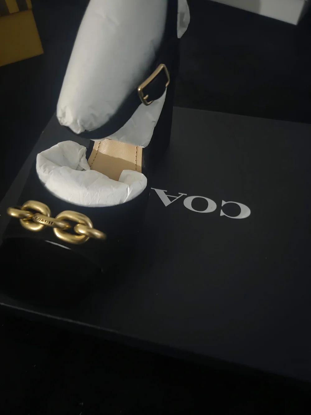 Coach black suede